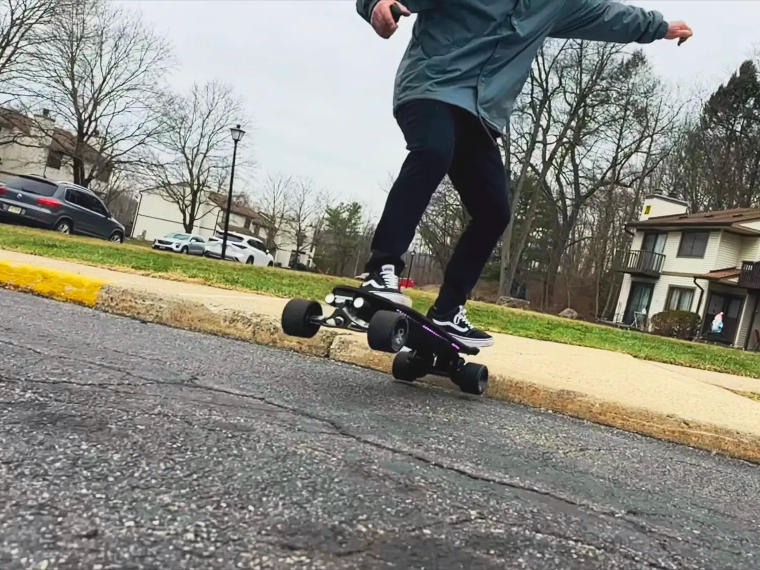 OMW Gladius electric skateboard with kicktail and carbon fiber flex deck
