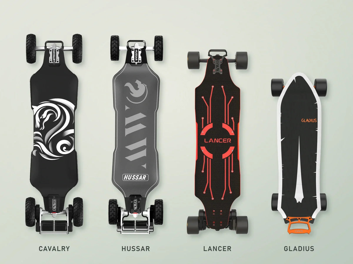 Front views of the OMW Cavalry, Hussar, Lancer and Gladius electric skateboards, highlighting their deck shapes