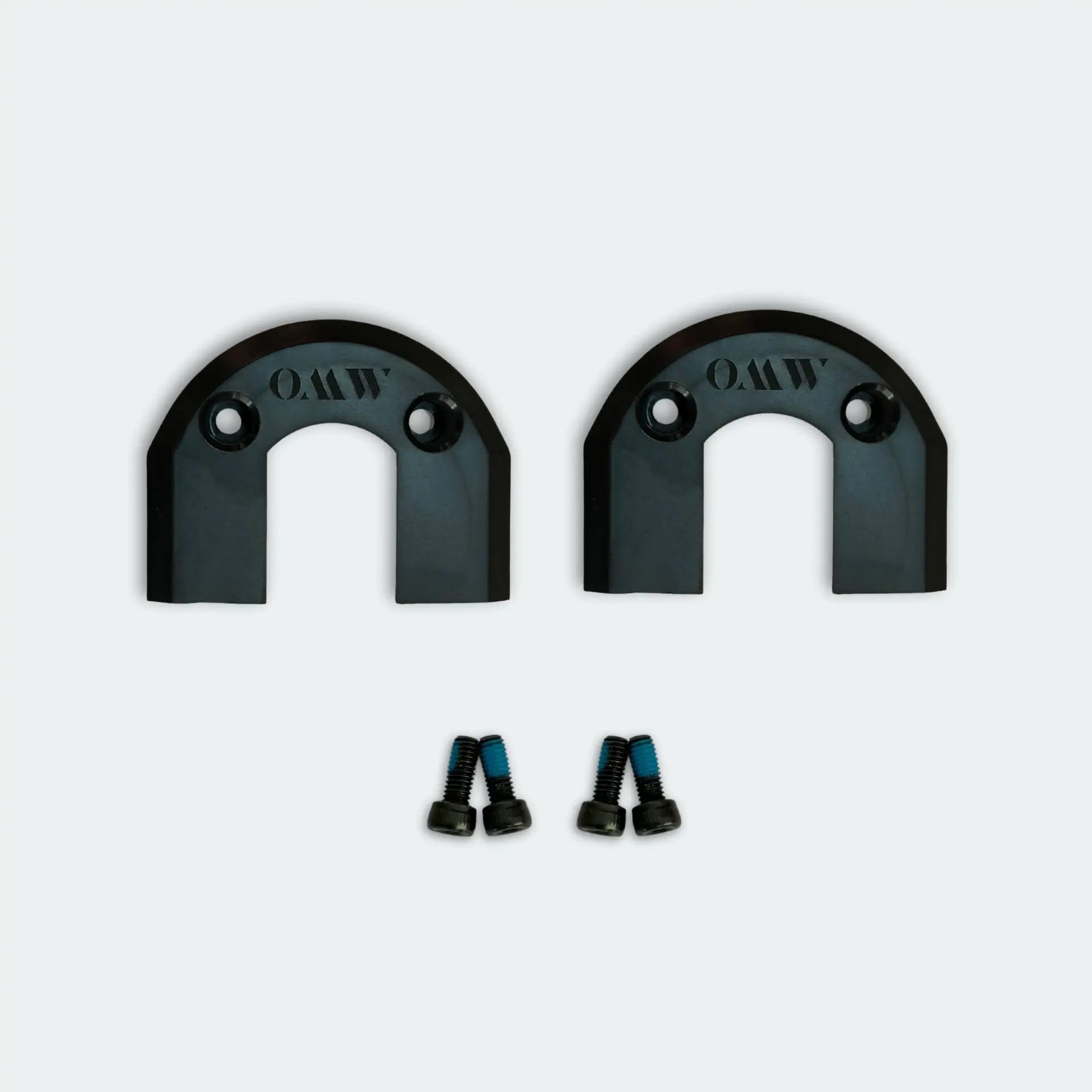 Two black electric skateboard belt covers with screws
