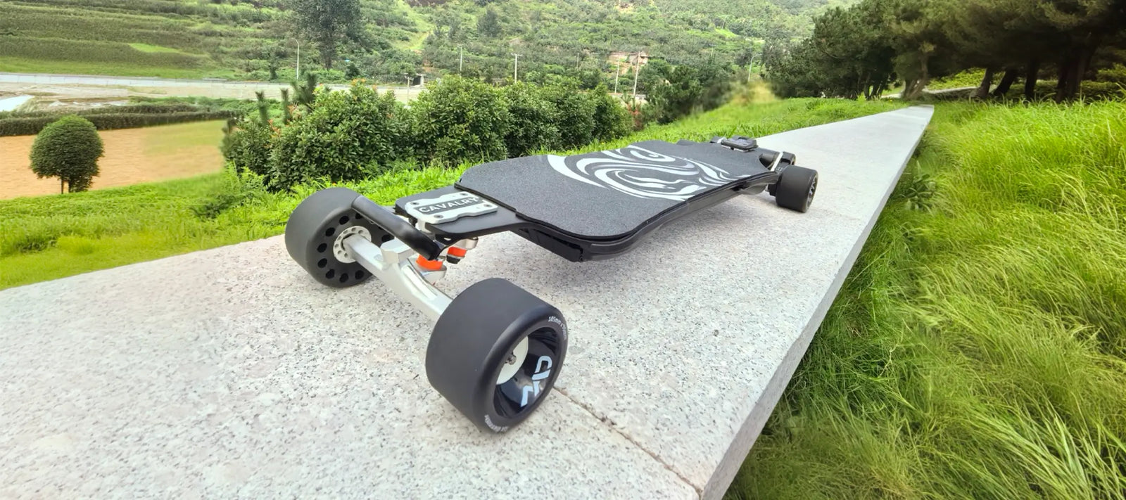 OMW Cavalry electric skateboard with CNC DKP trucks